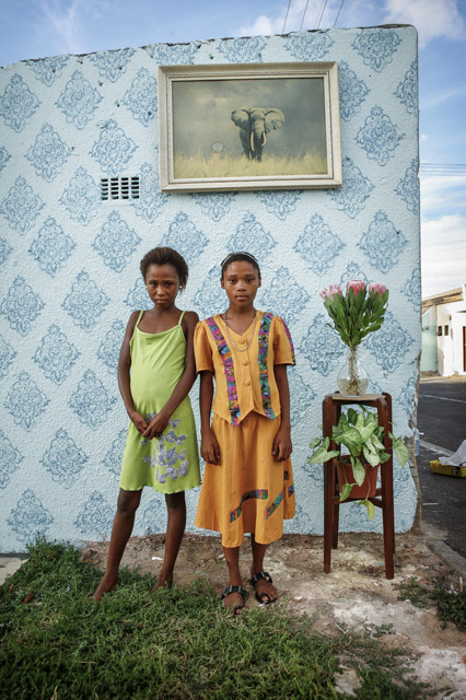 Alexia Webster, Two friends, names not given, posing for their portrait on the corner of Cornwell and Hercules Street in Woodstock, Cape Town, South Africa, 2011. From the series Street Studios, 2011 – 2018 © Alexia Webster, Prix Pictet